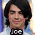 Four- of Joe Jonas images with text overlays: top-left shows him in white, top-right wears a hat and gray jacket, bottom-left is on stage holding a guitar, bottom-right has red lips
