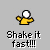 Pixelated figure in yellow shirt with white head, arms extended left and right, below text "Shake it fast!!!" on gray background.