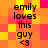 A pixelated image with repeating text 'emily loves this guy <3' on a checkered background of orange, yellow, and pink squares.