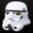 Pixelated white helmet with black visor stripe and dark eye slits on a solid black background.