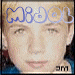 nine identical pixelated images showing a person with light hair, blue top, and 'Midol' text above the head, with 'am' text below the face