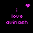 Pixelated pink text and symbols on black background with animated heart and starburst effects.