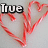 Red heart-shaped candy canes form a cluster with text overlays changing from 'True' to 'Love' and an emoticon '<3' in the bottom-right corner.
