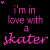 A static image displays pink text on a black background with a gray rectangle in the bottom right corner.