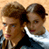 Static 49x49 pixel buddy icon showing two human figures in close proximity with brown hair and light skin tones against a beige background.