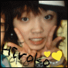 A 4-frame contact sheet of a person with dark hair and bangs holding their cheeks, wearing a yellow top, with text and heart symbols changing across frames.