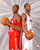 Static pixelated image of two basketball players in red and white uniforms holding orange basketballs against a gray background.