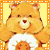 Two identical Care Bear characters in a contact sheet layout with orange borders and yellow backgrounds, each holding an object on their chest.