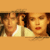 A static image featuring two people in a close-up pose against an orange background with bold black text reading "Come What May" and "Moulin Rouge."