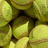 A static image with a red background divided into four quadrants, each containing text and an upper-left quadrant showing green pills.