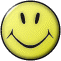 Two yellow circular faces with black outlines, one smiling and one frowning, displayed side-by-side on a gray background.