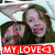 Two people in a photo frame with red text overlay; one person's mouth is open and the other's face is partially obscured.