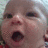 A pixelated close-up of a baby's face with an open mouth, repeated side-by-side with pink text 'LOVE <3' at the bottom right.