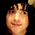 Pixelated static image of a cartoonish face with exaggerated features against black background, likely from Santa Clause 2 movie icon set.