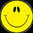 A static yellow smiley face icon with black eyes and a curved mouth, bordered by a pixelated gray outline on a dark background.