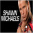 Pixelated static image shows a person with light brown hair and red clothing on the right, next to large white text reading 'SHAWN UCHES' on black background.