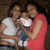 Three people pose together in a static image with two variations showing different background tones.