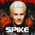 Two side-by-side animated frames of a character with short blonde hair and dark clothing against a fiery background, each displaying the name "SPIKE" in bold text.