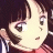 A 48x48 pixel buddy icon featuring a close-up of an anime-style character with brown hair and large eyes, alongside stylized text on a black background.