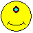 Two side-by-side pixel art smiley faces with a single eye, one neutral and one smiling, on gray background.