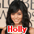 six identical images of a woman with long dark hair smiling, each with the word 'Holly' in different colored text below her face