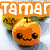 Pixelated orange fruit with smiling face, green leaves, and 'Tamar' text on yellow background.
