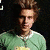 A person in a green shirt with white trim appears across three showing different head angles and facial expressions against dark backgrounds