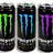 Three Monster Energy cans in green, blue, and purple with claw logos on a white background; large green 'I LOVE MONSTER!' text above yellow-green claw logo on black.