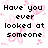 Pixelated text on white background with pink floral patterns, reading 'Have you ever looked at someone and realized you were smiling the whole time' in black block letters.