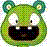 Pixelated green cartoon character with large white eyes, black pupils, and a wide open mouth showing two teeth.
