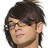 A pixelated image of a person with dark hair and glasses, overlaid with pink text reading "So Fie" on the left side.