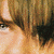 A pixelated collage of three distinct headshots showing a person with brown hair and light skin, each in different poses against white backgrounds.