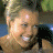 A 48x48 pixel animated contact sheet showing two frames of a Johnson Family Vacation-themed buddy icon with a character on the left and text/logo on the right against a green background.