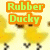 Animated yellow duckling with brown eyes and beak, walking on black feet against a light background; text changes from 'Rubber Ducky' to 'Your The One'.