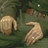 Pixelated image of a person in green clothing with two hands visible, next to white text on a black background reading "Johnny Depp Likes To...".