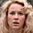 A 4-frame contact sheet of a pixelated King Kong movie scene featuring a blonde woman with curly hair in various expressions and the text "KING KONG" on black background.
