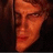Pixelated image of a person with brown hair and a dark background, accompanied by red pixelated text reading "the DARK SIDE" and "never looked so dang HOT!".