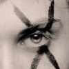 A grayscale close-up of a human eye with stylized black lines crossing over the eyelid and extending downward, creating a geometric pattern against a light background.
