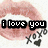 Pixelated image of lips forming a kiss with text 'i love you' in black boxes and 'xoxo' below, on white background.