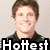 A four- shows a person in black athletic wear with white stripes, smiling against a light background; text overlays read "Hottest," "Guy," and "Alive."
