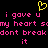 Yellow pixelated heart symbol above pink text reading 'i gave u i gave u my heart smy heart so dont breakdont break it' on black background.