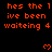 Red text on black background reads 'hes the 1 ive been waiteing 4' with pixelated hearts appearing and disappearing in a pattern