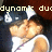 Pixelated image of a person with light skin and dark hair wearing a white shirt, with partial text reading 'dynamic du' above.