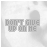 Animated sequence showing text "DON'T GIVE UP ON ME" with changing letter opacity and a blue arrow moving across the top-left corner.