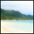 A beach scene with turquoise water and green hills, featuring pixelated text that changes across frames.