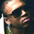A four- shows a person with dark hair and sunglasses in different poses, with text overlays changing between