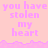 Pink background with repeated text "you have stolen my heart" in light purple, featuring a pixelated wave-like border.