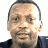 Pixelated image of a person with short dark hair wearing a dark shirt against white background, alongside blue text on black and gray backgrounds.