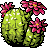 Pixelated cactus with green body, white spots, and three pink flowers on brown stems against gray background.