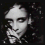 Black-and-white pixelated image of a person with dark hair, hand near mouth in two views and close-up eye view.